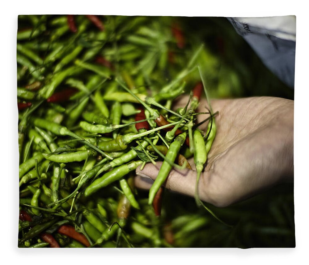 Mid Adult Women Fleece Blanket featuring the photograph Pile Of Fresh Chilis For Sale In Market by Niels Busch