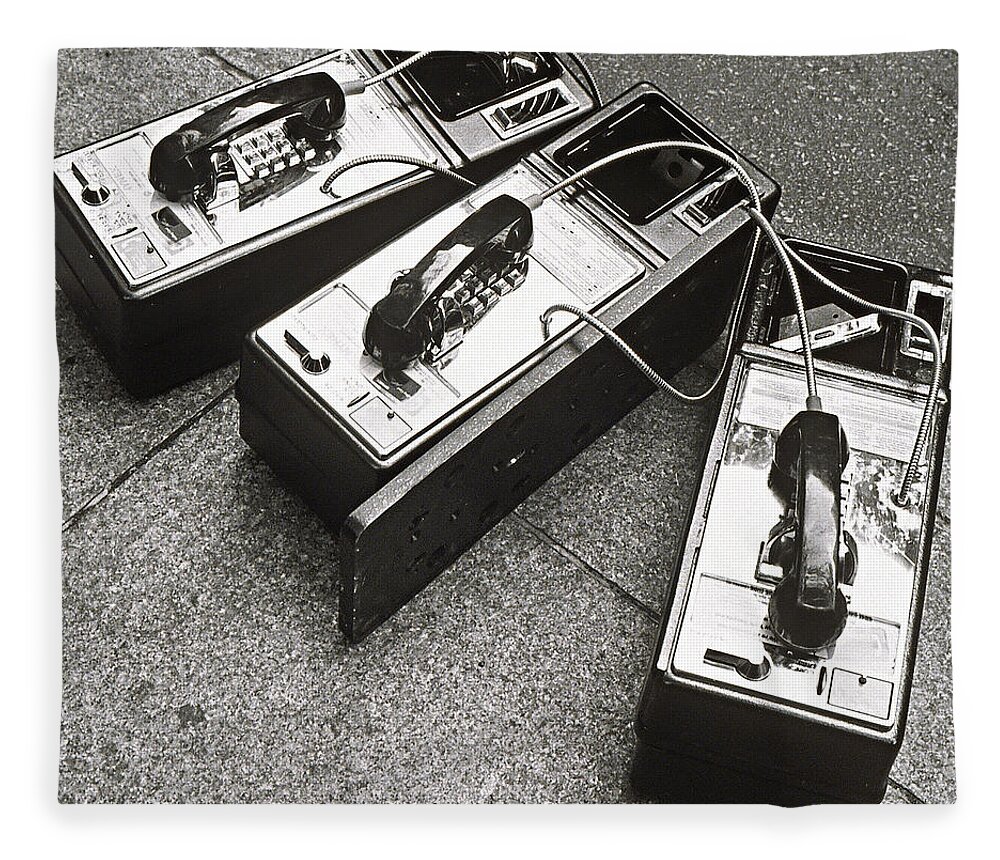 Telephone Fleece Blanket featuring the photograph Public Phones Lying On Sidewalk by Henri Silberman