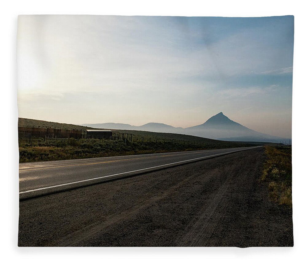 Rural Fleece Blanket featuring the photograph Road through the Rockies by Nicole Lloyd