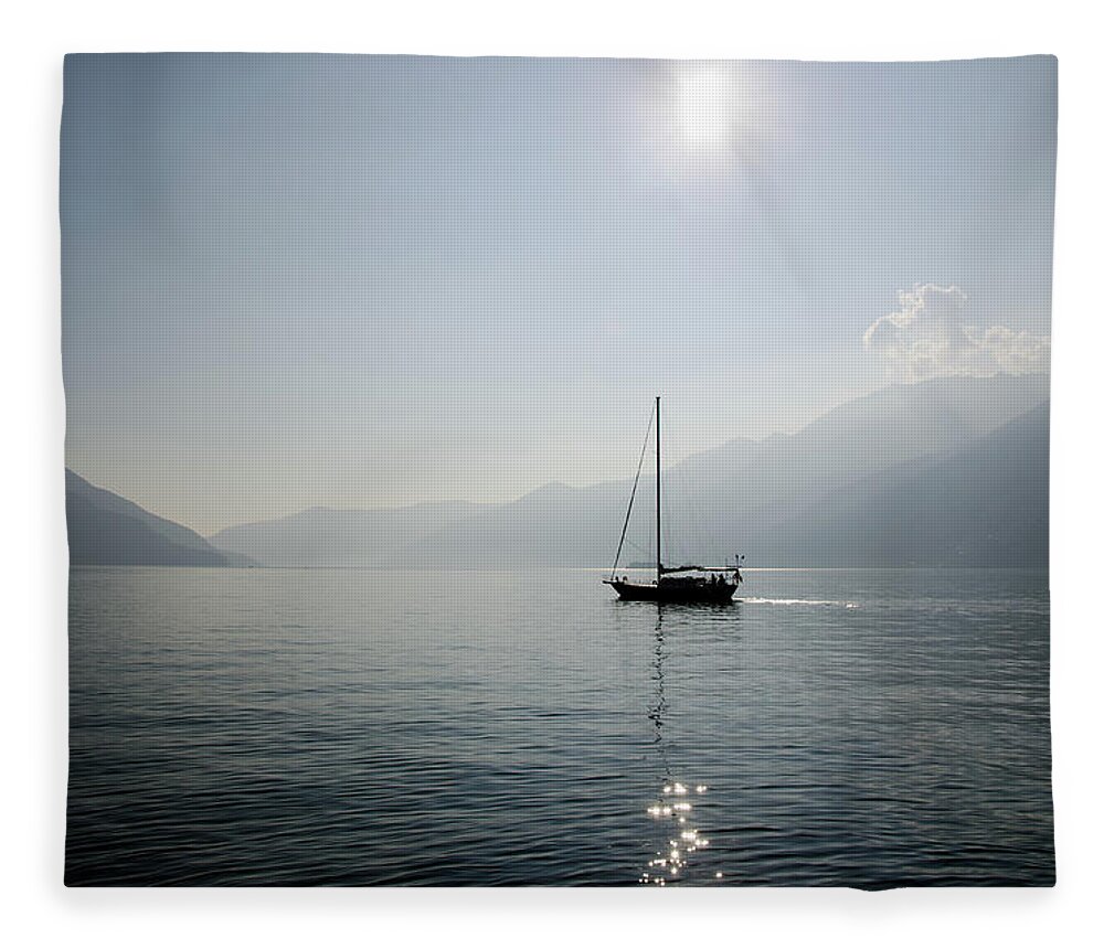 Sailboat Fleece Blanket featuring the photograph Sailing Boat In Alpine Lake by Mats Silvan