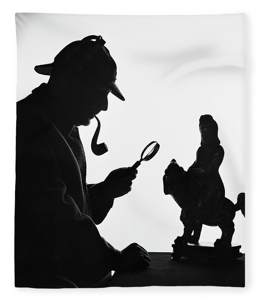 Pipe Fleece Blanket featuring the photograph Silhouette Of Man Wearing Deerstalker by H. Armstrong Roberts