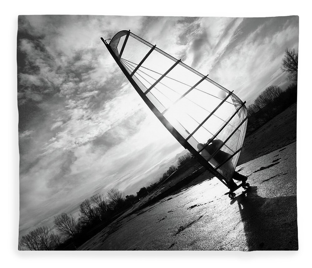 Shadow Fleece Blanket featuring the photograph Skater With Surf Sail by Kees Smans