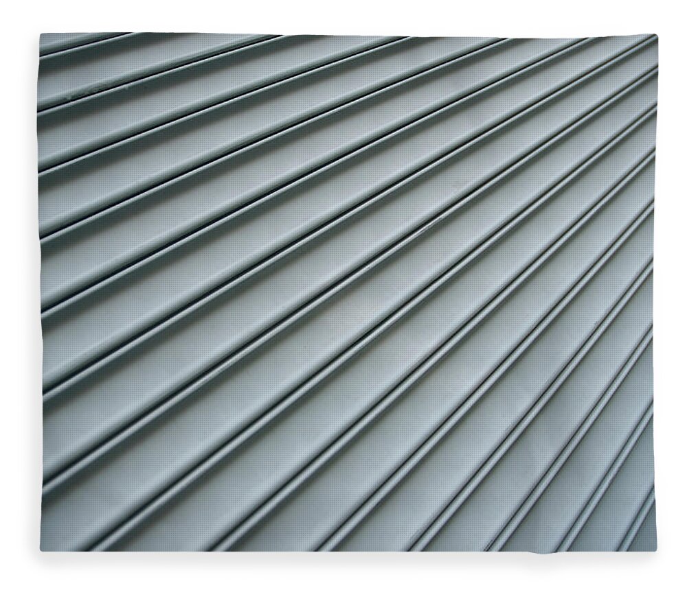 Metalwork Fleece Blanket featuring the photograph Steel Shutter Lines Background Diagonal by Peskymonkey