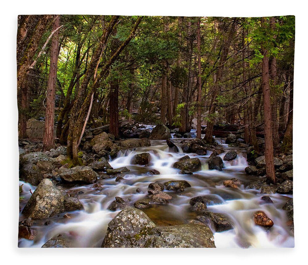 Tranquility Fleece Blanket featuring the photograph Stream Flowing Through Rocks by Erik Lykins