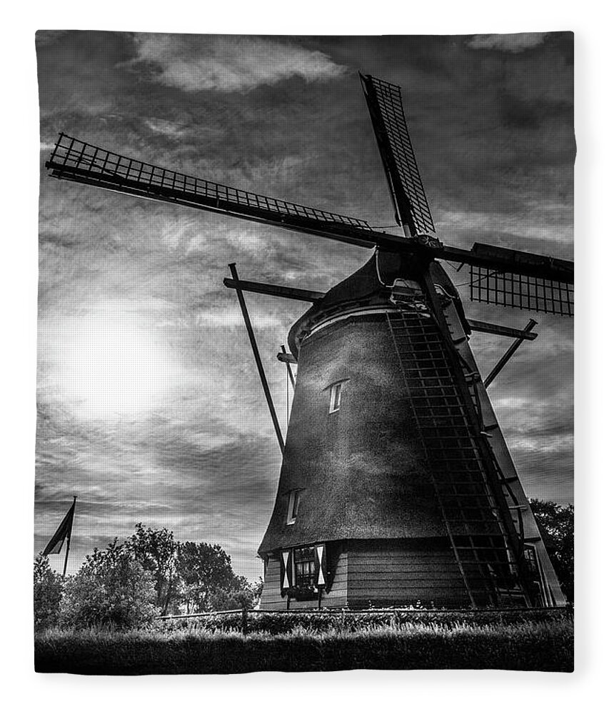 Clouds Fleece Blanket featuring the photograph Sundown over Holland in Black and White by Debra and Dave Vanderlaan