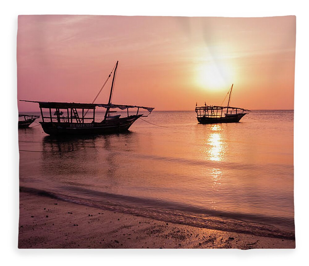 Sunset Fleece Blanket featuring the photograph Sunset in Zanzibar by Lyl Dil Creations
