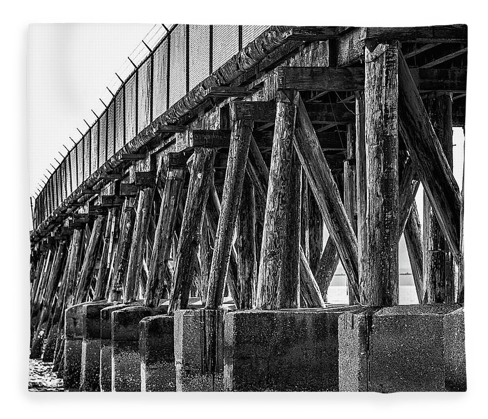 Harbor Fleece Blanket featuring the photograph Supports on Old Abandoned Pier by Darryl Brooks