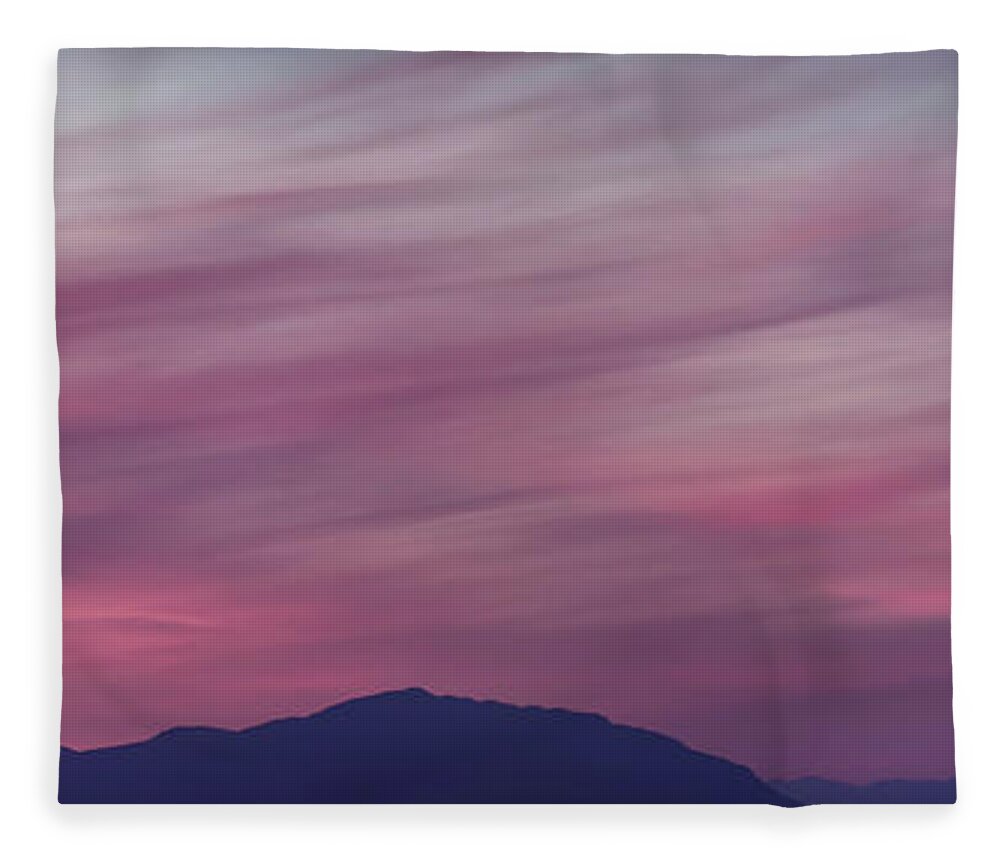 Skies Fleece Blanket featuring the photograph Surreal red twilight sky panorama above mountains on the Pacific by Awen Fine Art Prints