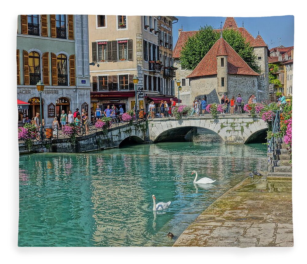 Canal Fleece Blanket featuring the photograph Swans Swimming in Annecy by Patricia Caron