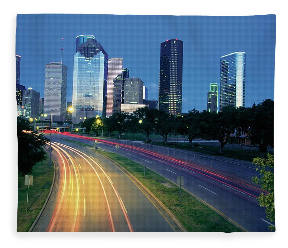 Grass Fleece Blanket featuring the photograph Traffic On The Road At Night, Allen by Medioimages/photodisc