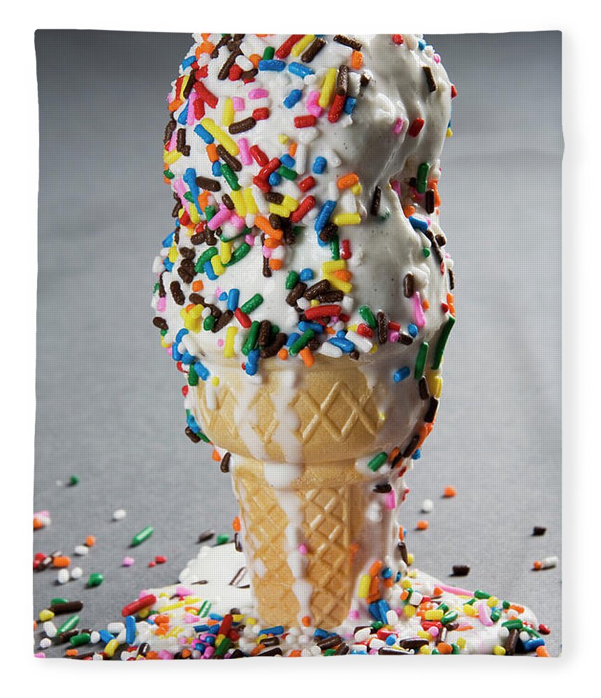 Melting Fleece Blanket featuring the photograph Vanilla Ice Cream Cones With Sprinkles by Henry Horenstein