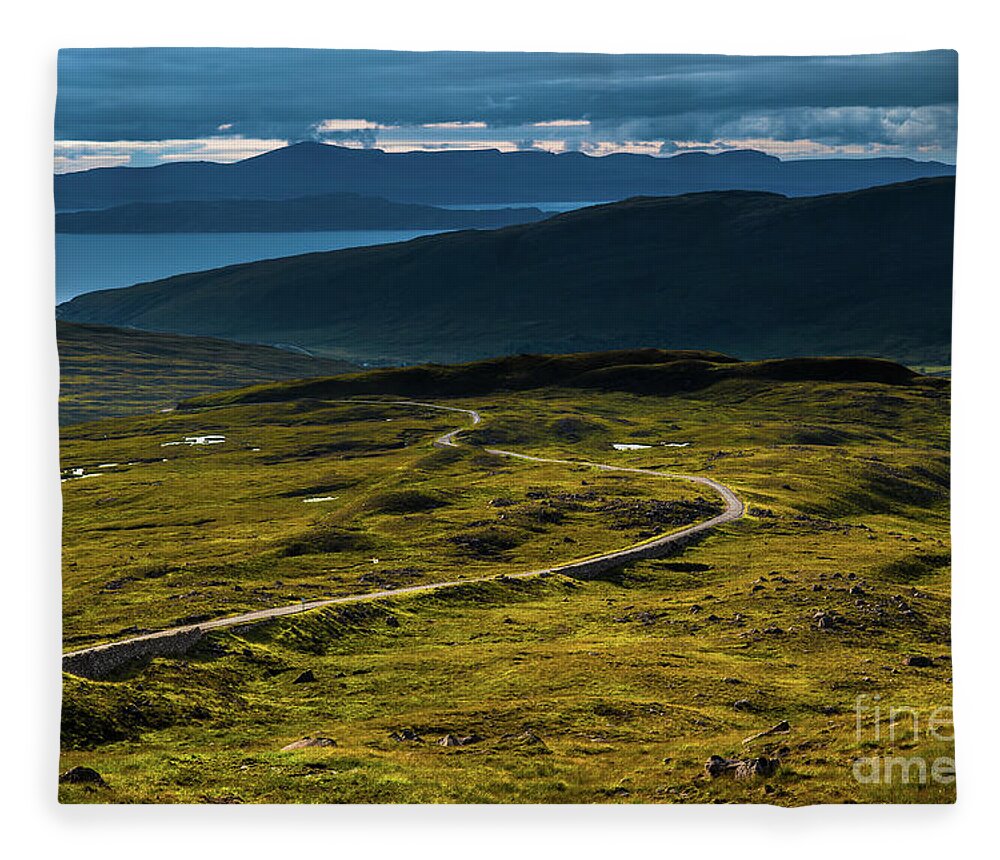Adventure Fleece Blanket featuring the photograph Applecross Pass, Scenic Landscape With Curvy Single Track Road And The Isle Of Skye In Scotland by Andreas Berthold