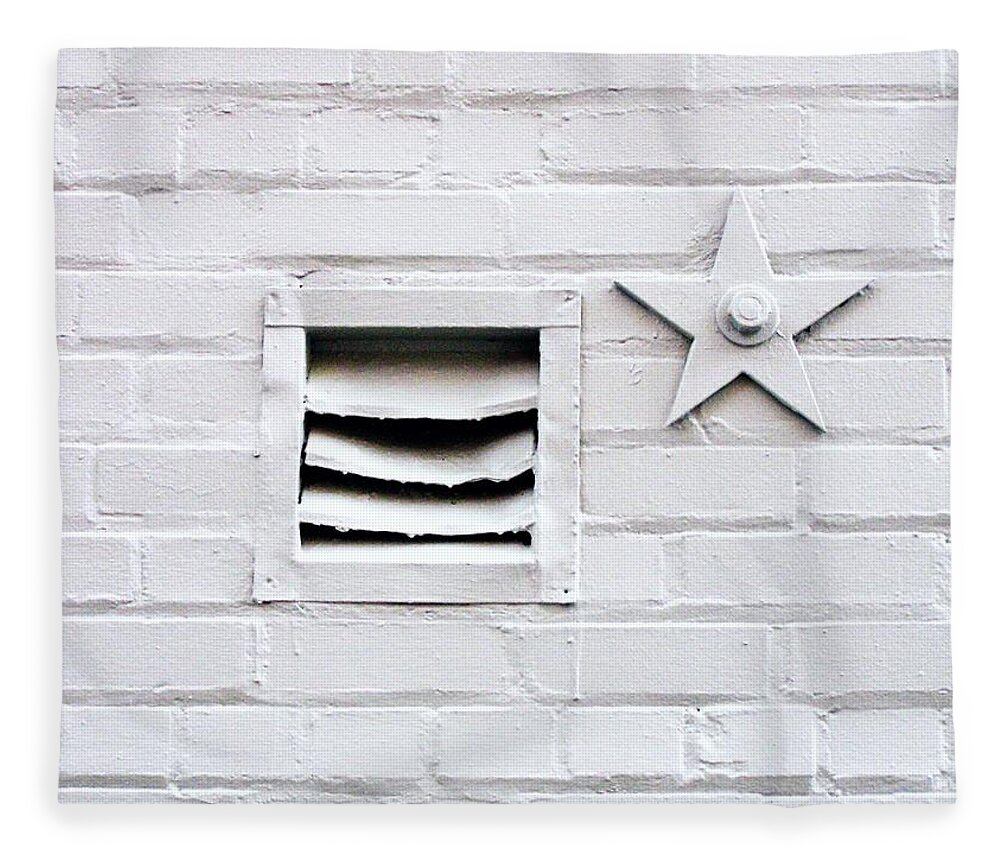 Outdoors Fleece Blanket featuring the photograph White Brick Wall With Vent And Star by Linus Gelber / Alert The Medium