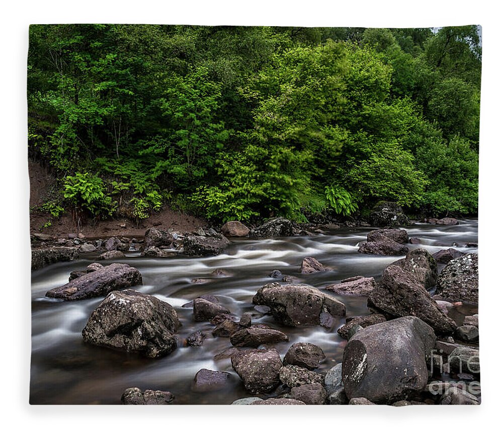 Background Fleece Blanket featuring the photograph Wild Mountain River Streaming Through Green Forest in Scotland by Andreas Berthold