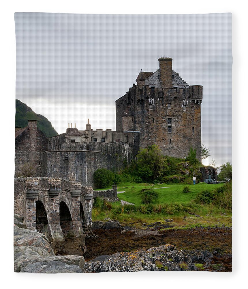 Scotland Fleece Blanket featuring the photograph Eilean Donan Castle in the loch Alsh at the highlands of Scotlan by Michalakis Ppalis
