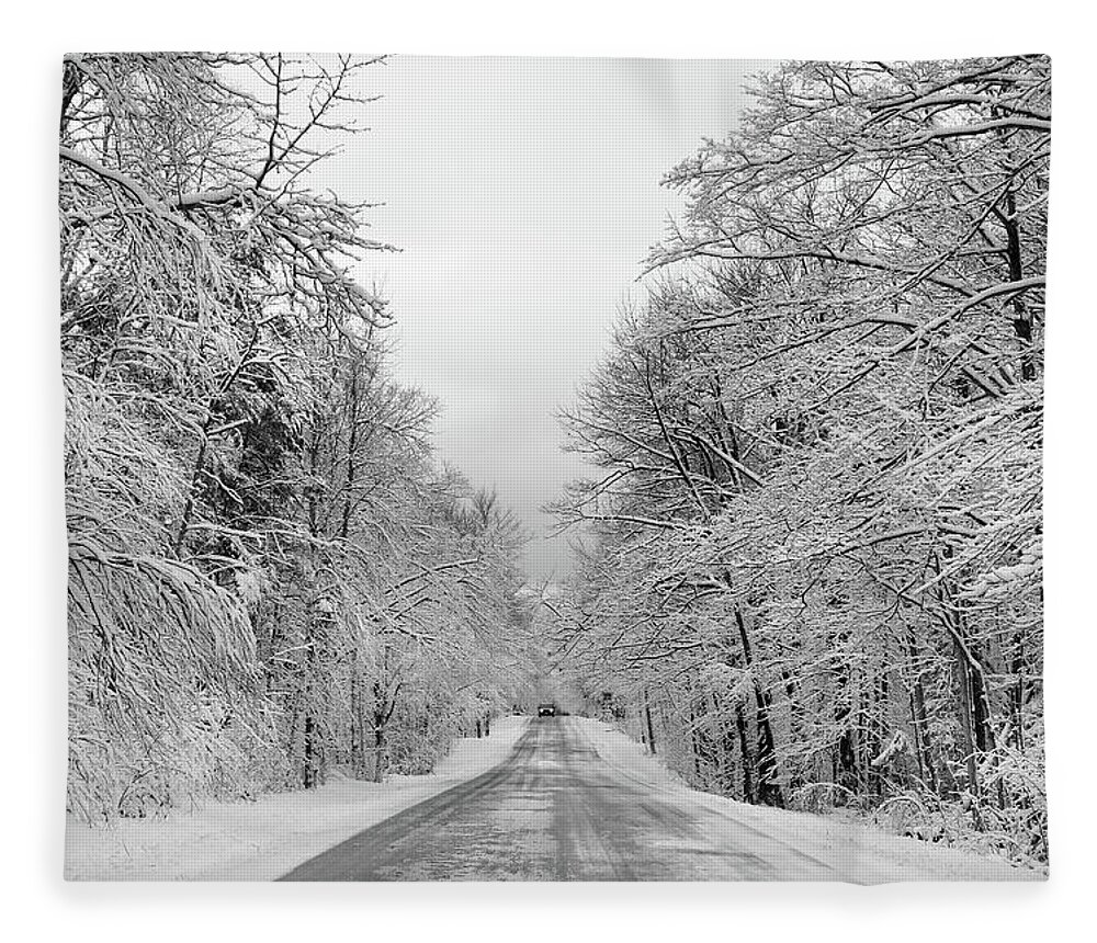 Back Road Fleece Blanket featuring the photograph Traveling Through the Fresh Snow by David T Wilkinson