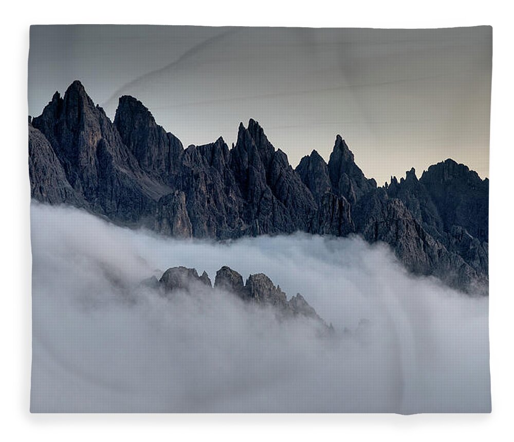 Dolomiti Fleece Blanket featuring the photograph Mountain landscape with mist, at sunset Dolomites at Tre Cime Italy. #1 by Michalakis Ppalis