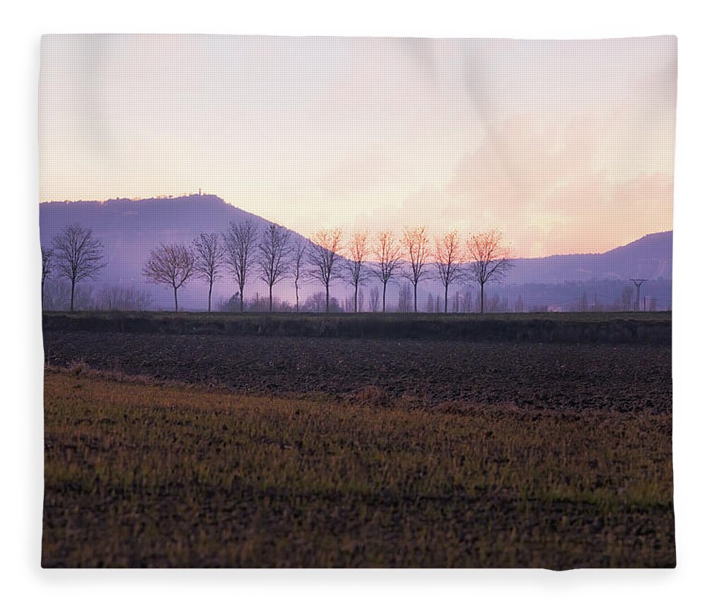 Agriculture Fleece Blanket featuring the photograph The mist settles in the valley after sunset by Jordi Carrio Jamila