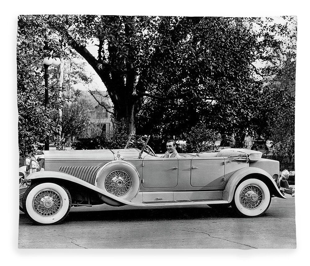 Duesenberg Fleece Blanket featuring the photograph 1930 Duesenberg with actor Gary Cooper by Retrographs