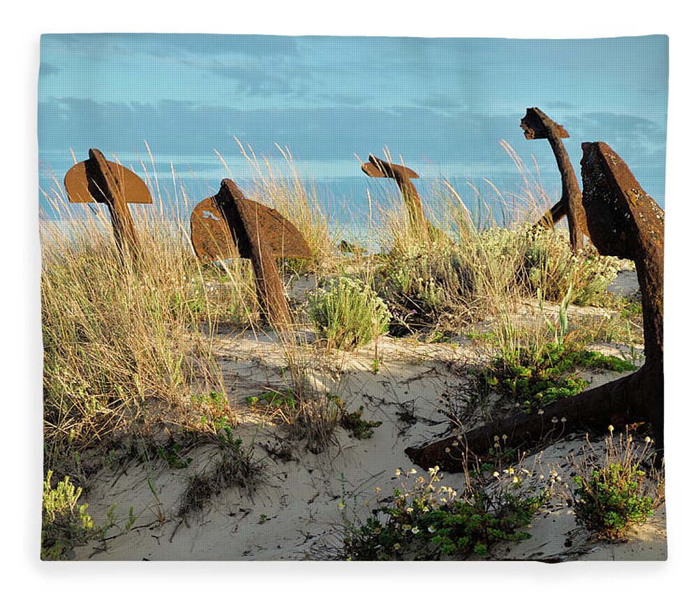 Praia Do Barril Fleece Blanket featuring the photograph Anchors and sunset in Barril beach #1 by Angelo DeVal