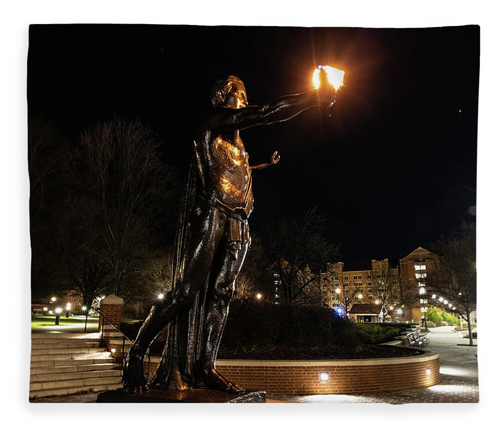 University Of Tennessee At Night Fleece Blanket featuring the photograph Torchbearer statue at the University of Tennessee at night #2 by Eldon McGraw