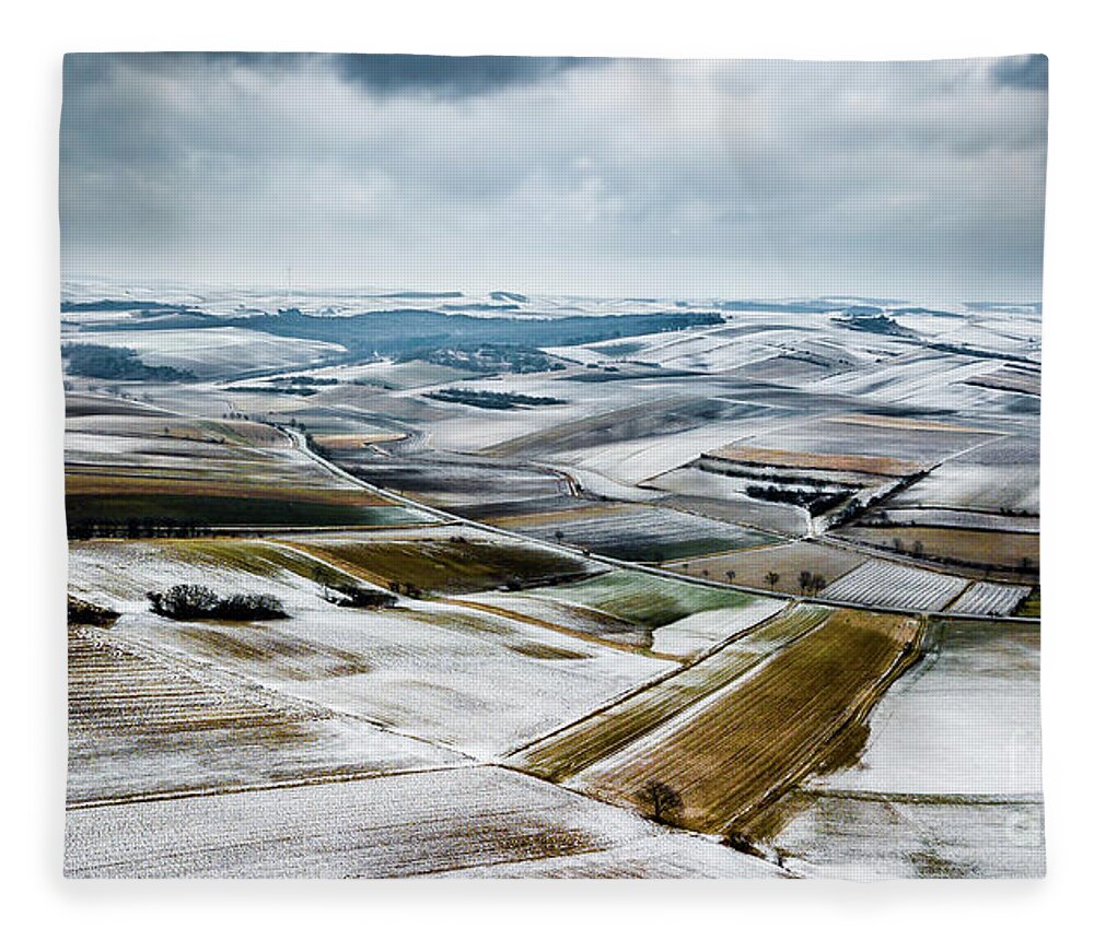 Above Fleece Blanket featuring the photograph Aerial View Of Winter Landscape With Remote Settlements And Snow Covered Fields In Austria by Andreas Berthold