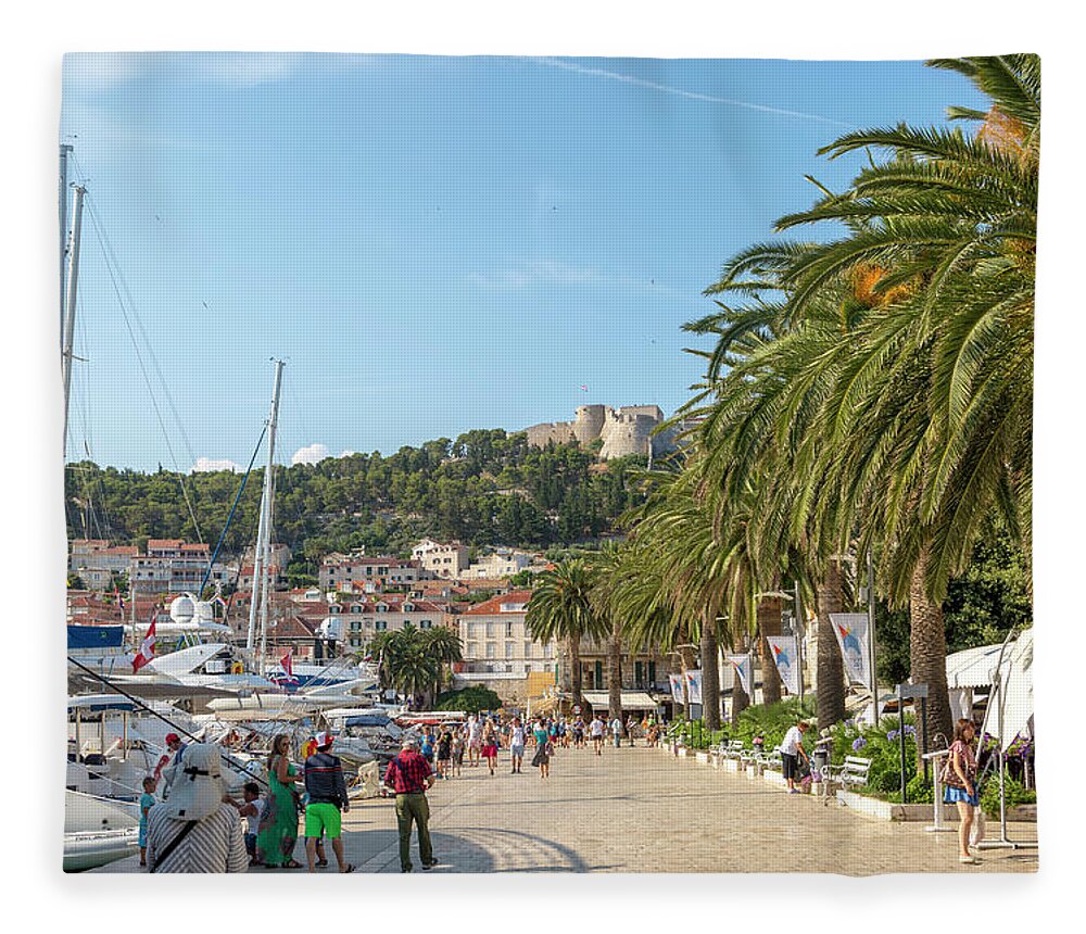 Europe Fleece Blanket featuring the photograph Along the Harbor in Hvar by W Chris Fooshee