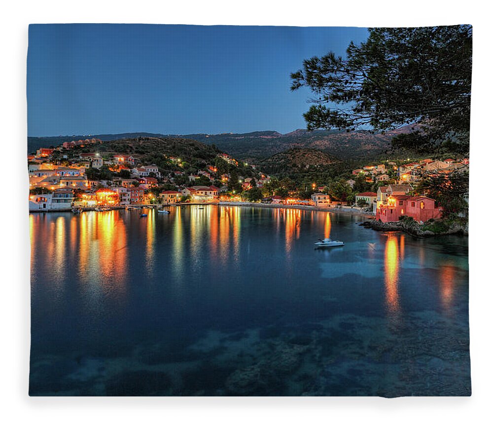 Assos Fleece Blanket featuring the photograph Assos by night in Kefalonia, Greece by Constantinos Iliopoulos