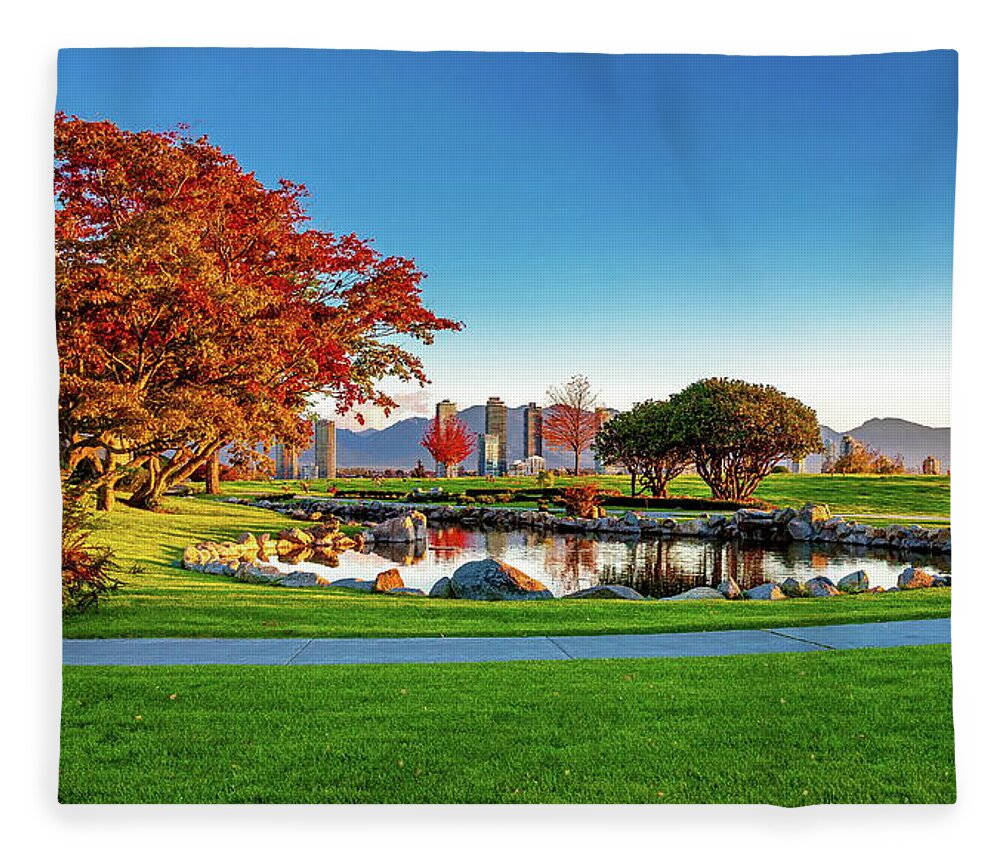 Alex Lyubar Fleece Blanket featuring the photograph Autumn day in the city park by by Alex Lyubar