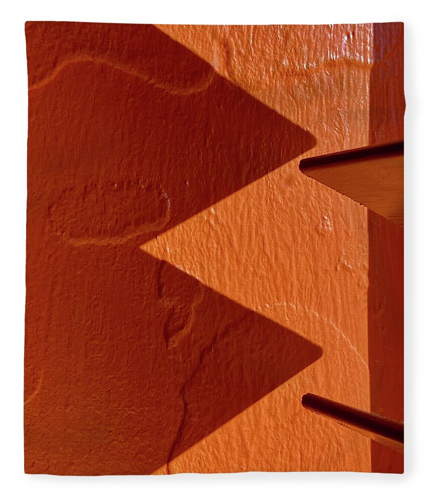 Shadows Fleece Blanket featuring the photograph Aztec Shadows #1 - venetian blind shadow at a Mexican restaurant on orange wall by Peter Herman