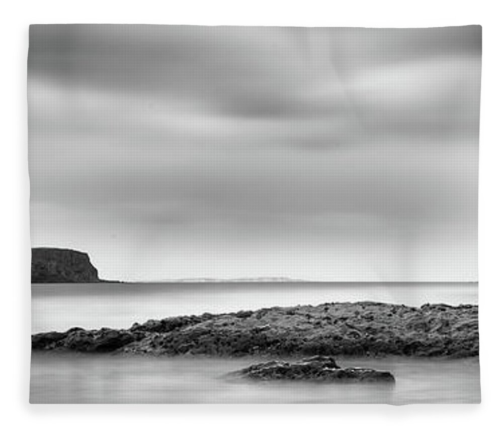 Island Fleece Blanket featuring the photograph Ballintoy Beach by Nigel R Bell