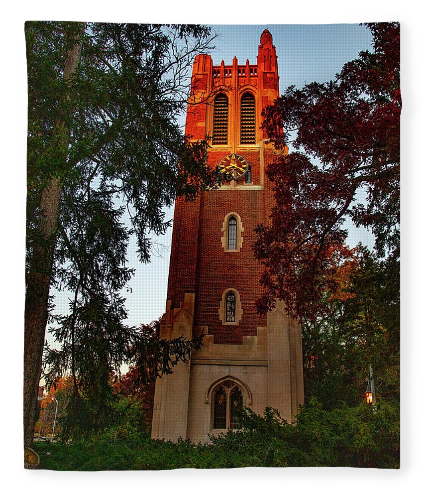 Michigan State University Fleece Blanket featuring the photograph Beaumont Tower on the Michigan State University campus at sunrise by Eldon McGraw