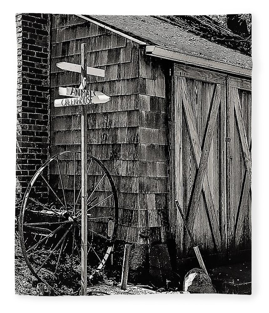  Barn Wheel Sign Dwelling Door Black White Fleece Blanket featuring the photograph Benner's Farm by John Linnemeyer