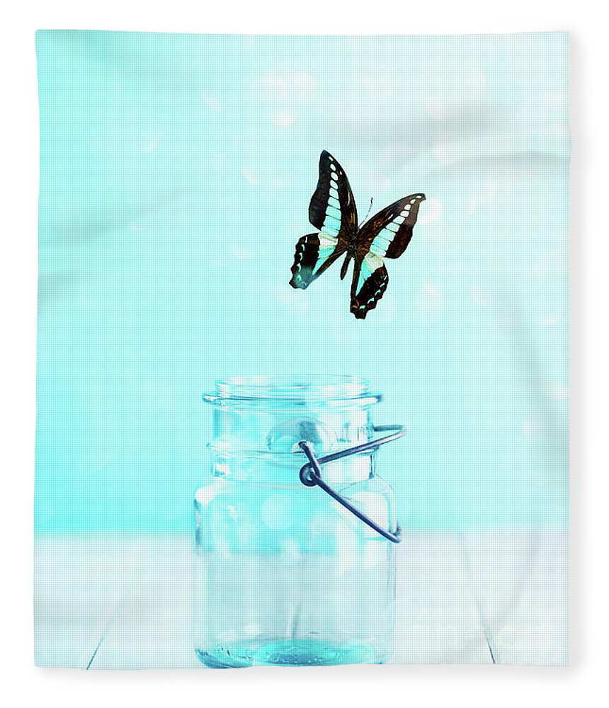 Bluebottle Fleece Blanket featuring the photograph Bluebottle Butterfly Escaping a Blue Mason Jar by Stephanie Frey
