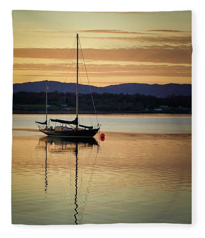 Blue Fleece Blanket featuring the photograph Boat On A Lake at Sunset by Rick Deacon
