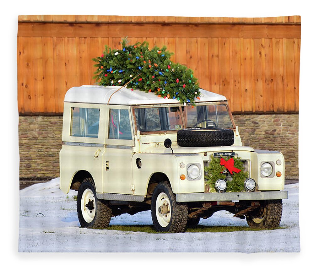 Land Rover Fleece Blanket featuring the photograph Christmas Land Rover by Nicole Lloyd