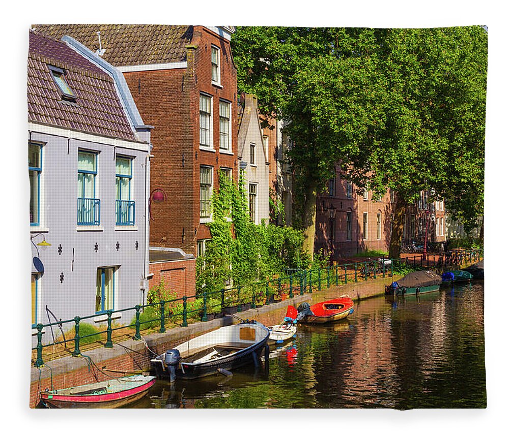 City Fleece Blanket featuring the photograph City canal in Amsterdam by Fabiano Di Paolo