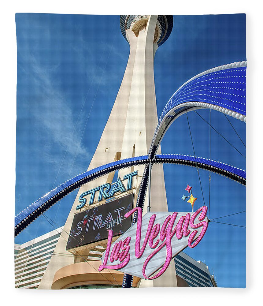 City Of Las Vegas Gateway Arch Fleece Blanket featuring the photograph City of Las Vegas Arch and the Strat From Below Portrait by Aloha Art