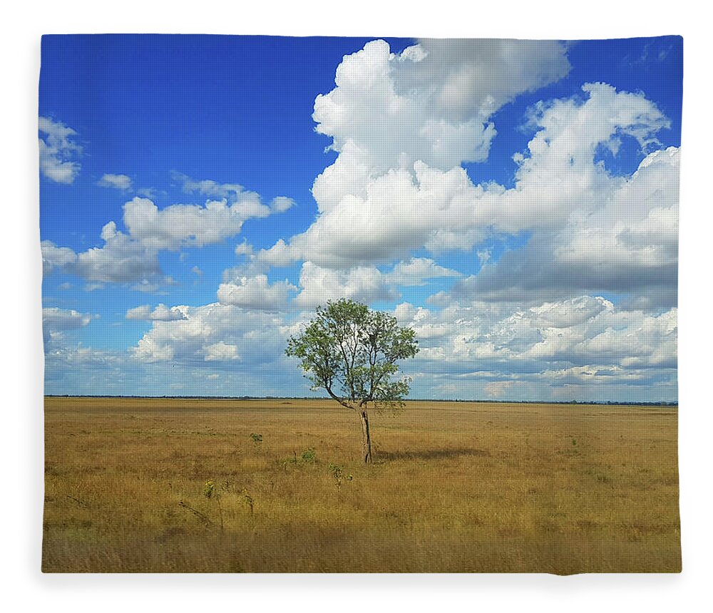 Tree Fleece Blanket featuring the photograph Clouds over a Lone Tree by Andre Petrov