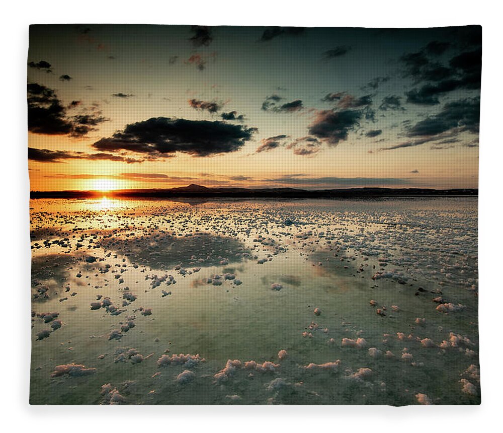 Sunset Fleece Blanket featuring the photograph Dramatic winter sunset in the lake. by Michalakis Ppalis