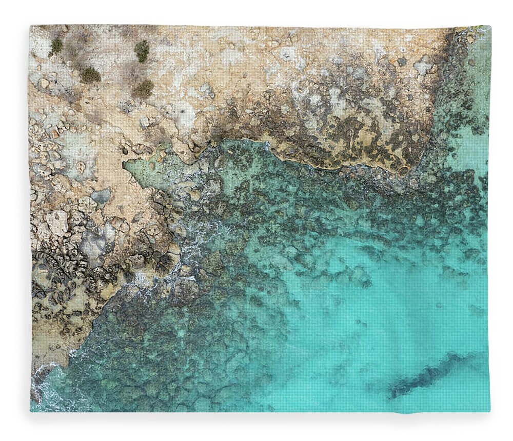 Rocky Beach Fleece Blanket featuring the photograph Drone aerial of rocky sea coast with transparent turquoise water. Seascape top view by Michalakis Ppalis