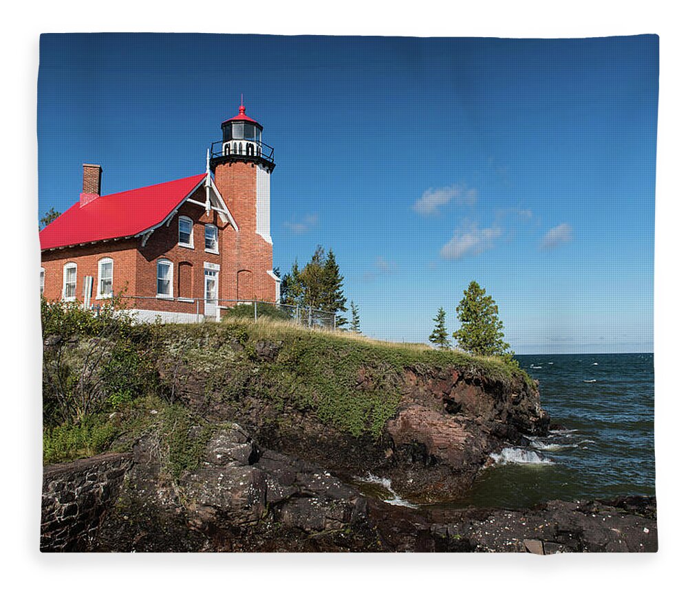Outdoors Fleece Blanket featuring the photograph Eagle Harbor Lighthouse by Linda Shannon Morgan