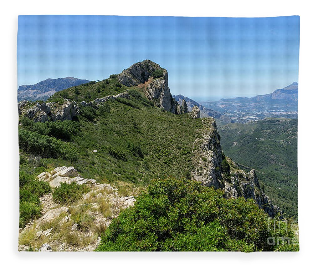 Mountain Fleece Blanket featuring the photograph Ferrer mountain ridge and view of Puig Campana by Adriana Mueller