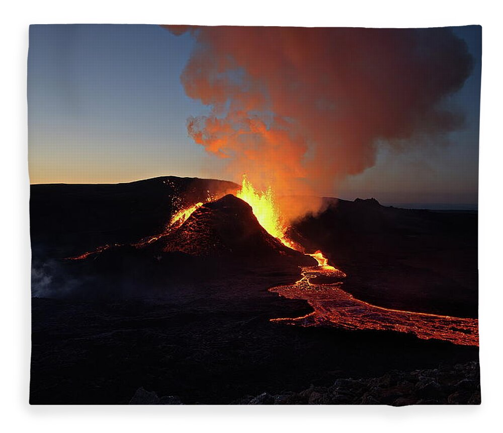Volcano Fleece Blanket featuring the photograph Flowing fire by Christopher Mathews