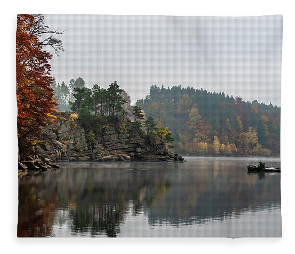 Austria Fleece Blanket featuring the photograph Foggy Landscape With Fishermans Boat On Calm Lake And Autumnal Forest At Lake Ottenstein In Austria by Andreas Berthold