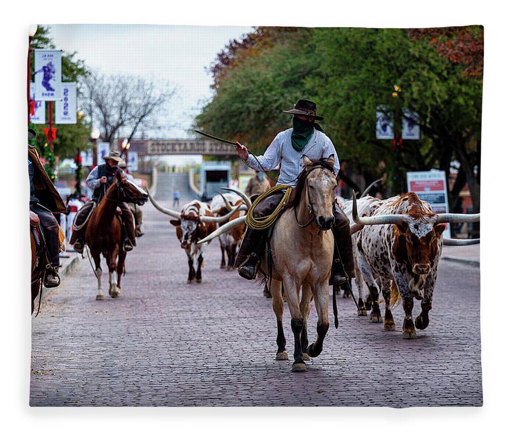 Texas Fleece Blanket featuring the photograph Fort Worth Stockyards Cattledrive by David Morefield