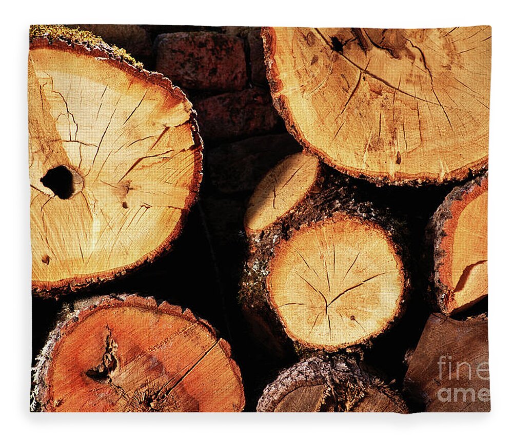 Log Fleece Blanket featuring the photograph Freshly cut and stacked tree logs by Mendelex Photography
