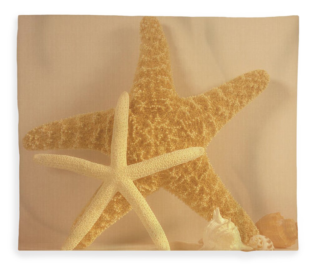 Ocean Fleece Blanket featuring the photograph Glamorous Stars and Shells by Angie Tirado
