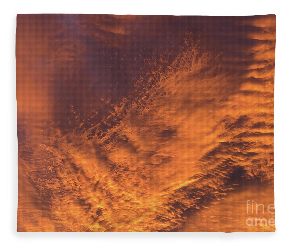 Clouds Fleece Blanket featuring the photograph Glowing sunset sky with deep orange clouds by Adriana Mueller
