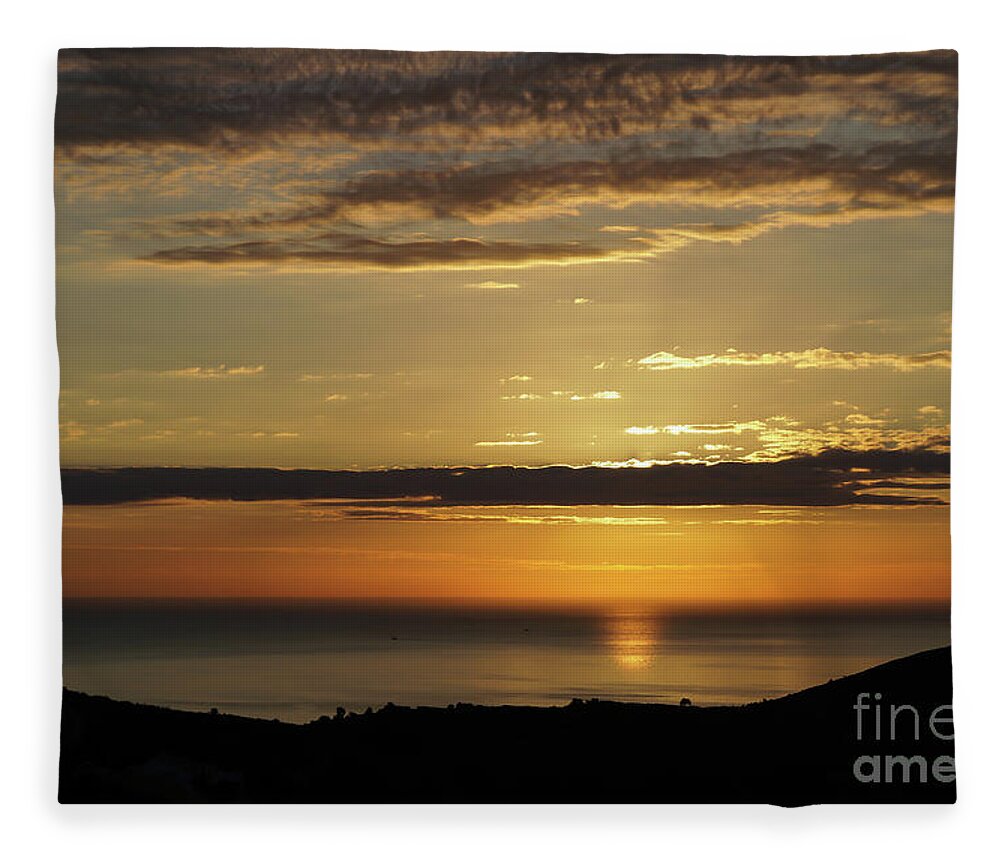 Clouds Fleece Blanket featuring the photograph Golden sunrise over the sea by Adriana Mueller